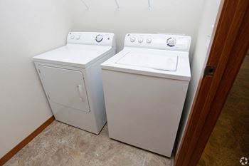 A washer and dryer in the laundry room